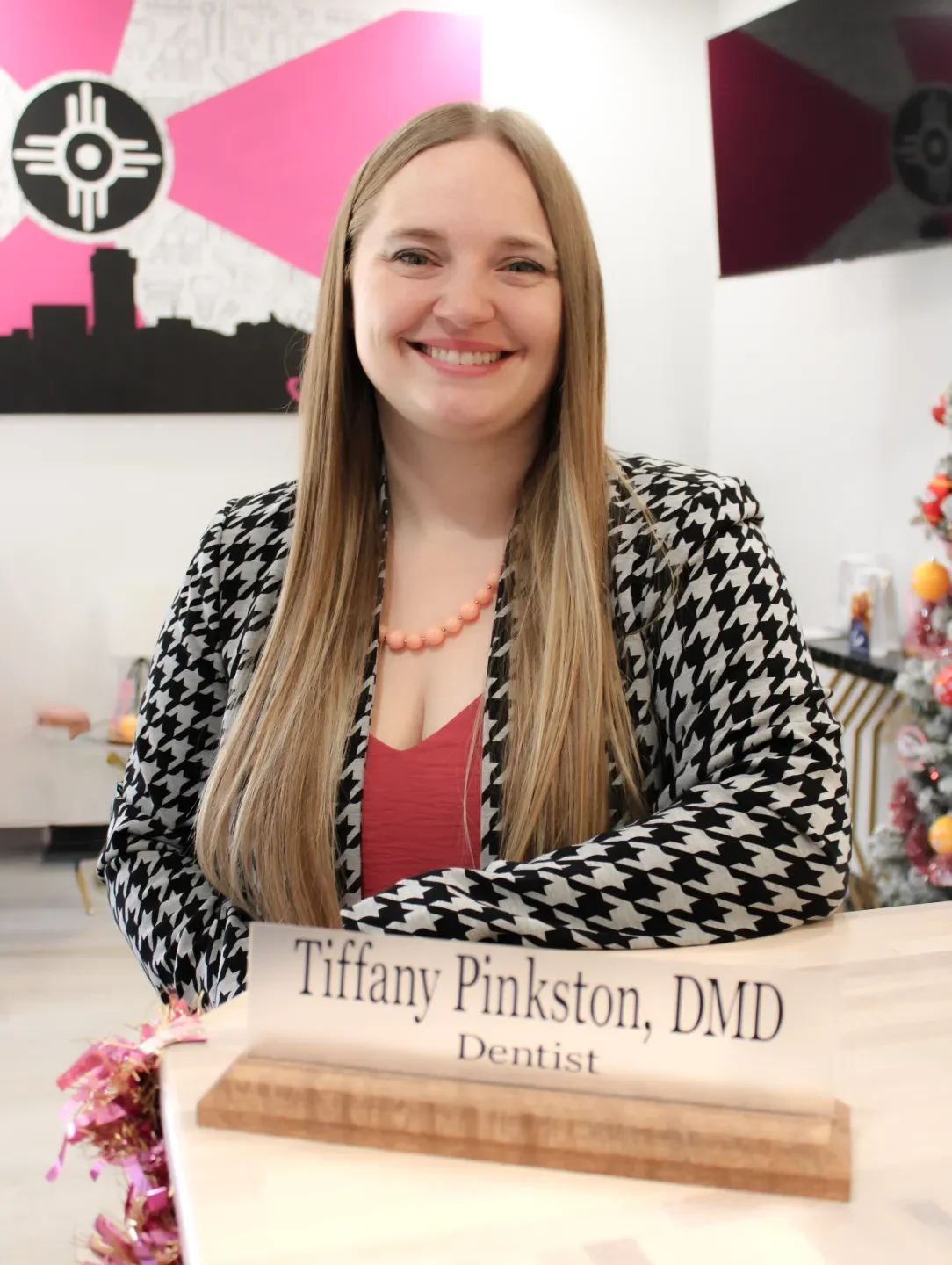 Dr. Tiffany Pinkston, DMD, at her desk in the Gemdenta office in Wichita