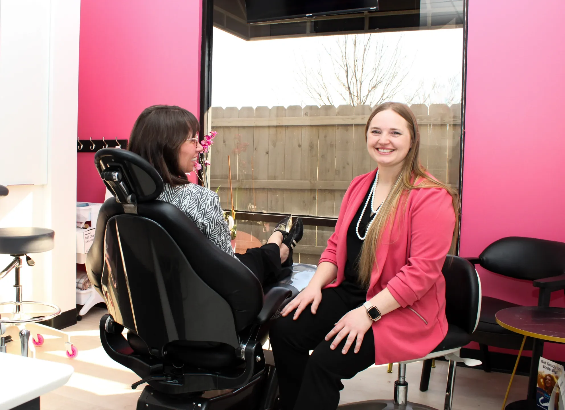 Dr. Tiffany Pinkston with a patient in the treatment room at Gemdenta in Wichita